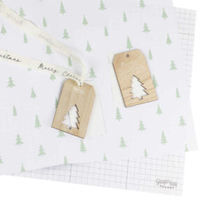 Christmas Wrapping Paper With Ribbon and Wooden Tag